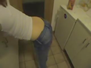 Home made porn movie features inviting brunette getting fucked in kitchen